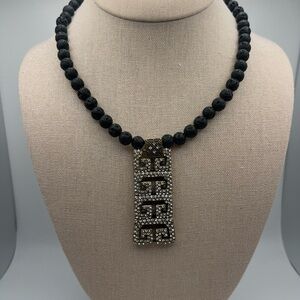 Elegant Black Beaded Necklace with Silver Pendant